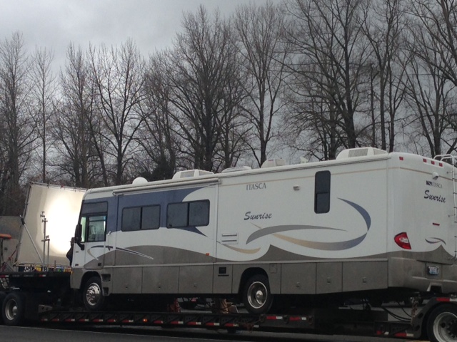 RV parked on Railroad Ave/King Street, lit for filming of Lucky Them