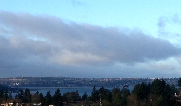Partly sunny skies over Lake Washington Sunday morning, 2/16/14, aren't expected to last long as 2nd strong storm approaches