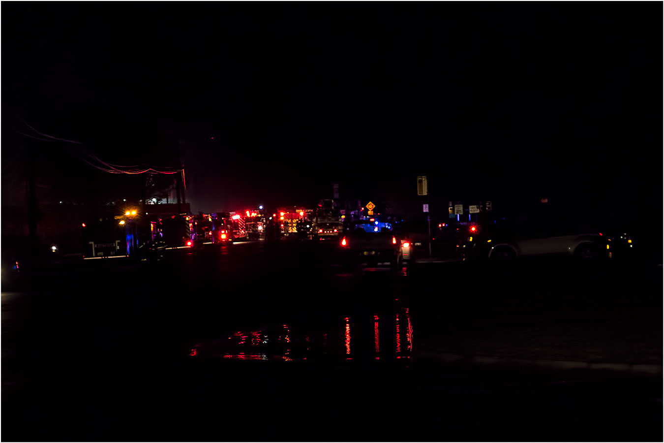 Photo by Danny Raphael. Fire crews on scene of North Bend way explosion, 4/25/14