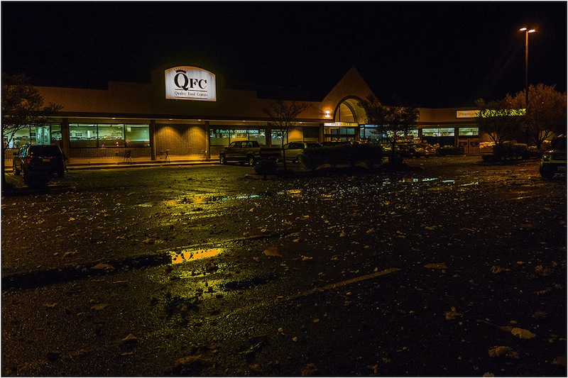Debris from North Bend explosion litters QFC parking lot on North Bend Way