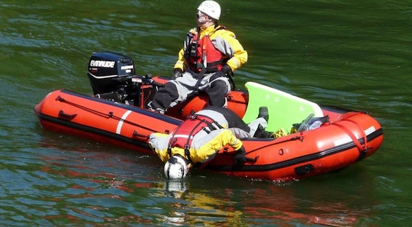 Rescue crews search Snoqualmie River for truck that was reported going into river overnight, 4/27/14. Photo: Liz Lawrence