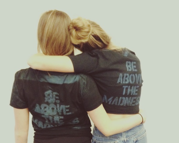 Elle Wilson and her good friend wear t-shirts against May Madness after being pitted against each other in the contest that ranks girls on their looks.
