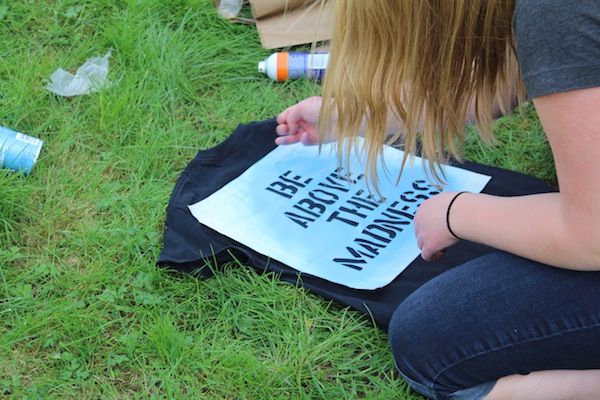 Mount Si Gender Equality group member making t-shirt against May Madness