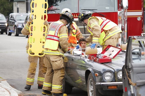 Firefighters work at MSHS mock crash, 6/4/14. Photo: CIty of Snoqualmie