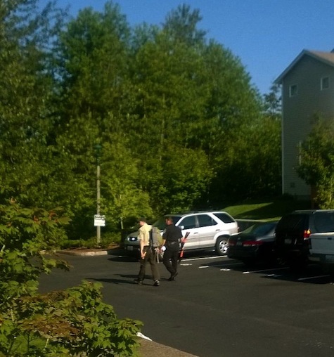Police and Fish and Wildlife officers respond to bear sighting near Mt. Si Cottages on Snoqualmie Ridge, 6/2/14. Photo: Megan Roberts