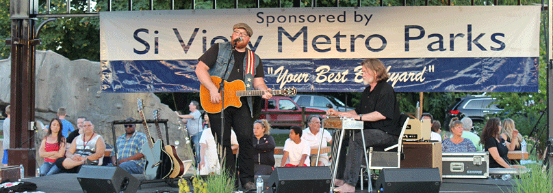 Autin Jenckes performing at a past North Bend Farmer's Market