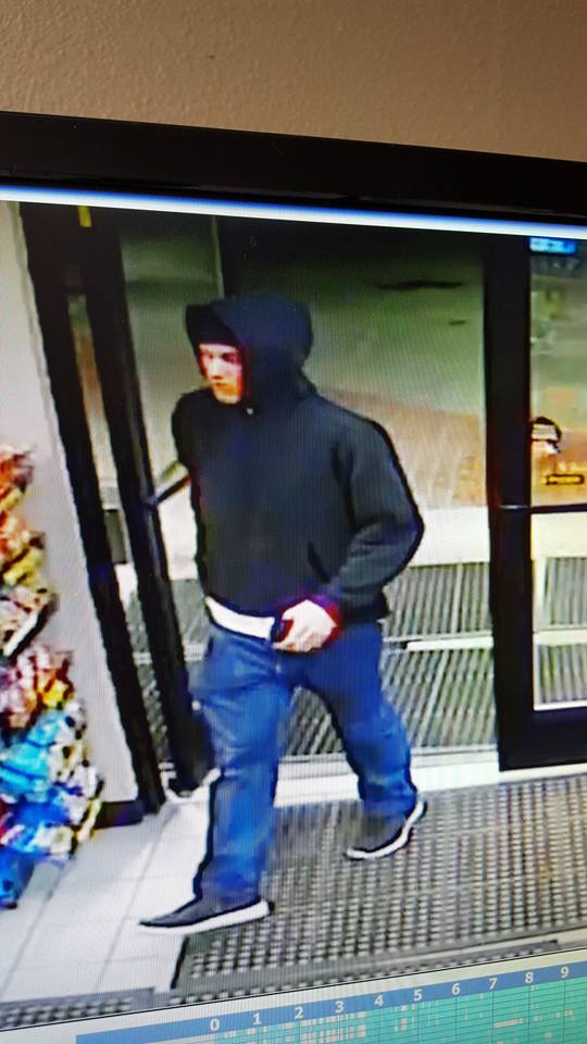 Scott's Dairy Freeze break-in suspect, 2/9/2016. Surveillance photo released by SPD.