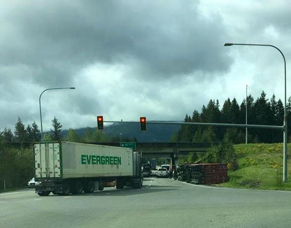Tipped semi at the I-90/SR 18 interchange on Friday, April 15, 2016.