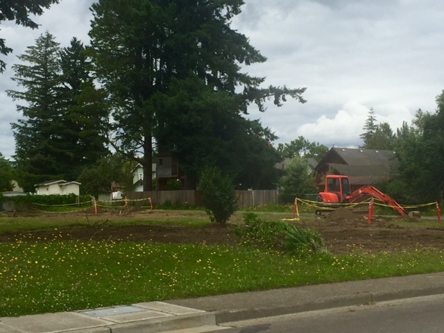 District purchased home behind Wildcat Stadium was torn down in July.
